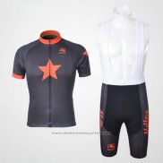 2010 Maillot Cyclisme Johnnys Orange et Noir Manches Courtes et Cuissard